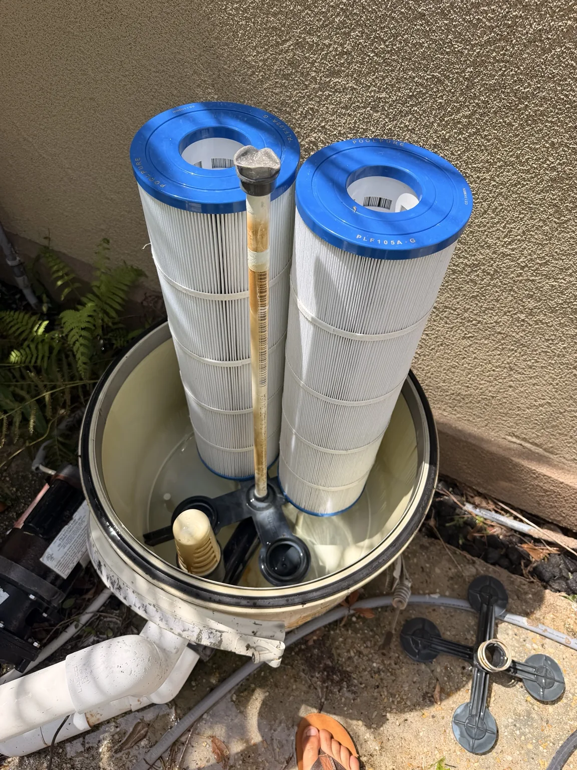 Cartridge filter cleaning in progress